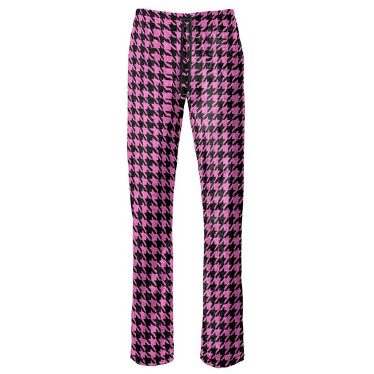 Pink and black houndstooth patterned pants